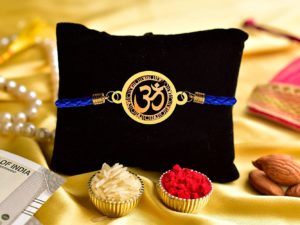 Gold Plated OM Bracelet Incredible Rakhi with Roli...